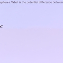 The figure shows two uniformly charged spheres.