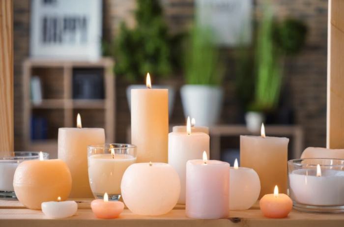 A candle manufacturer sells cylindrical candles